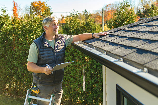 Professional Hail Damage Roof Repair technician working in Bishop, CA